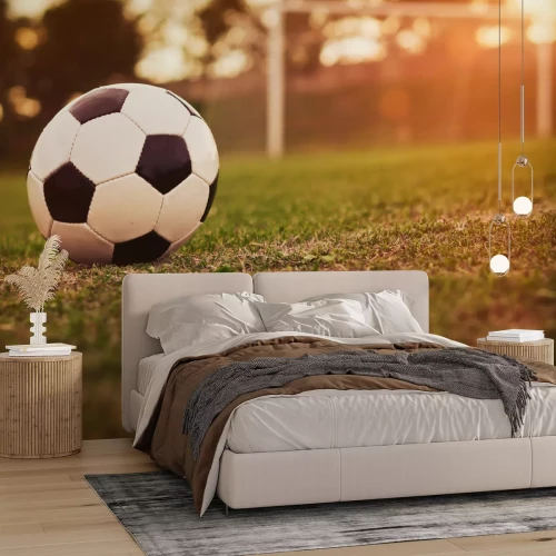 Fotobehang Voetbal in de zonsondergang