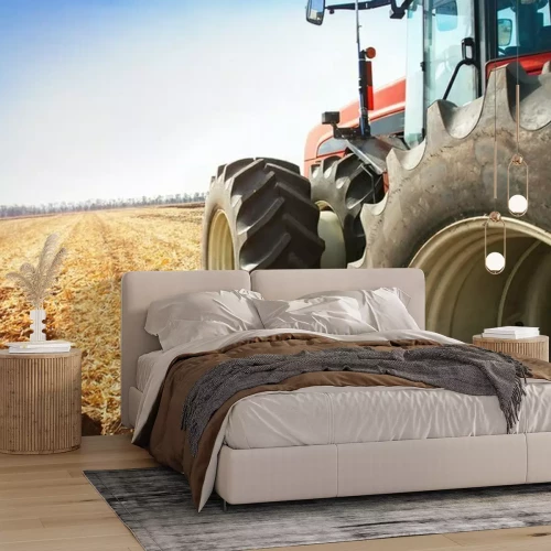 Fotobehang Moderne rode tractor op het gebied close-up.