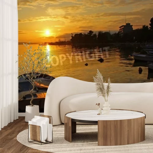 Fotobehang Zonsondergang en een boot