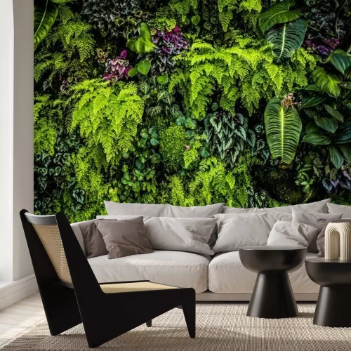Fotobehang Een muur bedekt met groene planten