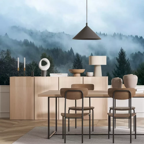 Fotobehang Mist tussen de bomen en heuvels