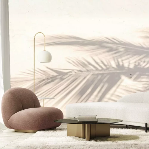 Fotobehang De schaduw van palmbladeren op het strand