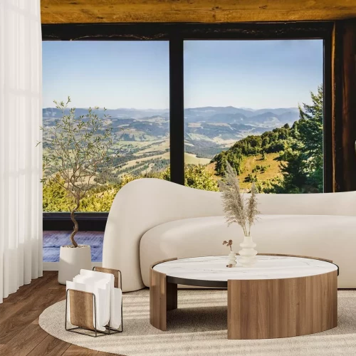 Fotobehang Zomer veld en bergen gezien door het raam