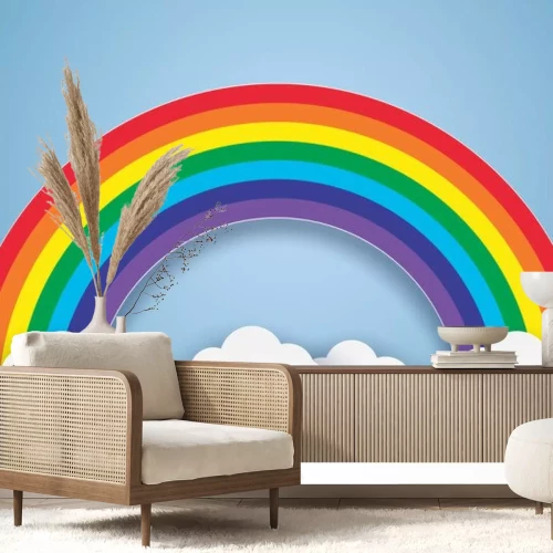 Sticker Blauwe lucht met een regenboog en wolken