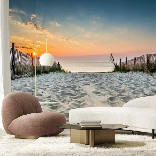 Fotobehang Zonsopgang op een zandstrand