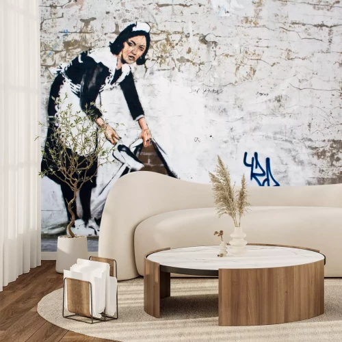 Fotobehang Bakstenen muur met Banksy graffiti