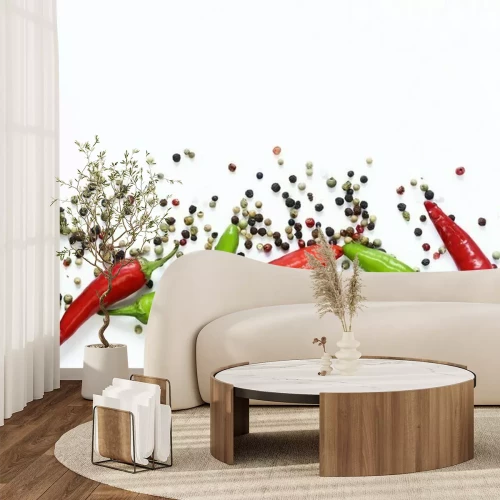 Fotobehang Hete pepers en peperkorrels op een witte achtergrond