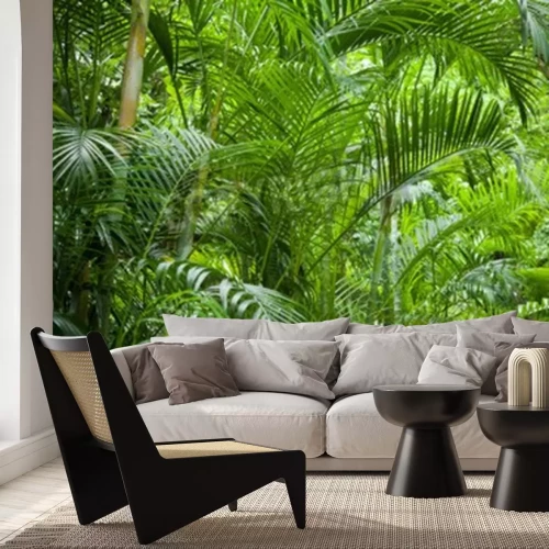 Fotobehang Palmbomen in een groene jungle