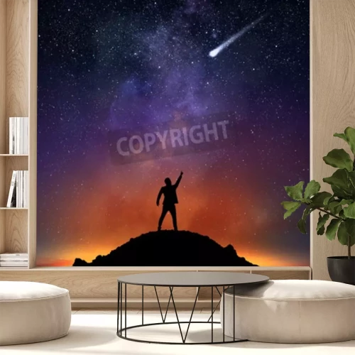 Fotobehang Man en een vallende ster