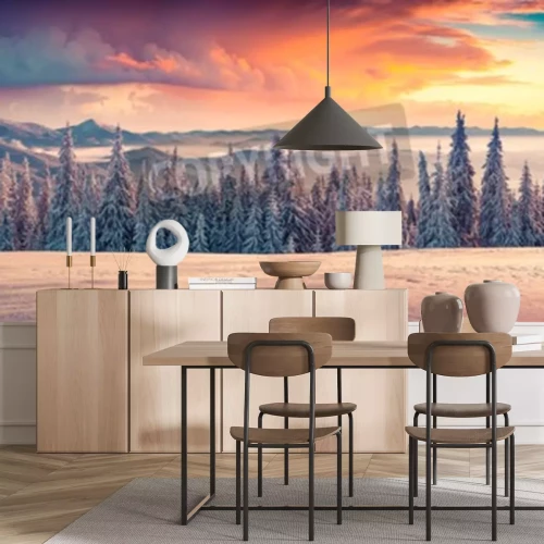 Fotobehang Zonsopgang achter kerstbomen op de bergen