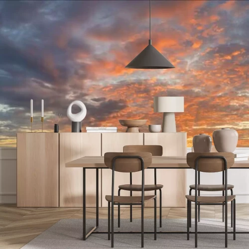 Fotobehang Zonsondergang tussen de wolken