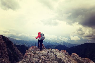 Fotobehang Mensen op een bergtop