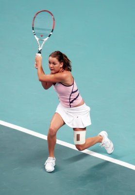 Fotobehang Agnieszka Radwanska speelt op de tennisbaan