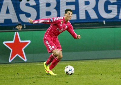 Fotobehang Christiano Ronaldo met de bal