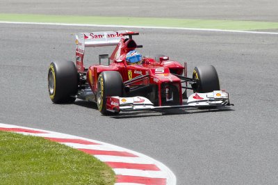 Fotobehang Formule 1 raceauto op de baan