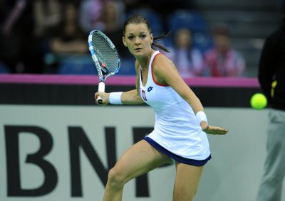 Fotobehang Agnieszka Radwanska tijdens een tenniswedstrijd