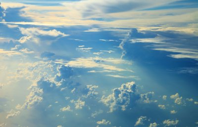 Fotobehang Lucht met heldere wolken