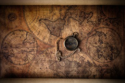 Fotobehang Verouderde wereldkaart met kompas