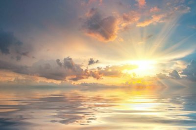 Fotobehang Zonsondergang weerspiegeld in het water