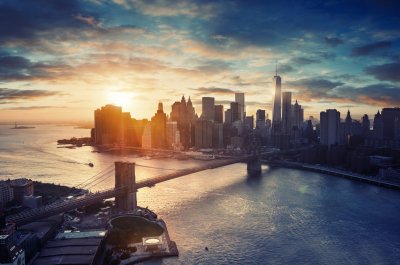 Fotobehang Zonsondergang achter Manhattan